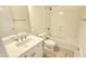 Bathroom featuring a vanity with an undermount sink and a tub/shower combo at 13613 W Cypress St, Goodyear, AZ 85395