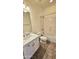 Bathroom features a vanity and tub/shower combo at 13613 W Cypress St, Goodyear, AZ 85395
