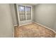 Simple bedroom with carpeted floor and neutral walls at 13613 W Cypress St, Goodyear, AZ 85395