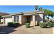 Charming single-story home featuring a well-kept front yard and a cozy, covered entryway at 13613 W Cypress St, Goodyear, AZ 85395