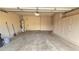 Spacious garage with overhead storage at 13613 W Cypress St, Goodyear, AZ 85395