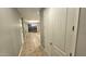Hallway with tile flooring leading to other rooms at 13613 W Cypress St, Goodyear, AZ 85395