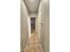 Hallway with tile floor and neutral walls at 13613 W Cypress St, Goodyear, AZ 85395