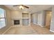 Living room with fireplace and neutral decor at 13613 W Cypress St, Goodyear, AZ 85395