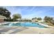 Inviting community pool area with ample seating at 13613 W Cypress St, Goodyear, AZ 85395