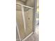 Shower with glass enclosure and grab bar at 13613 W Cypress St, Goodyear, AZ 85395