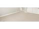 Bedroom featuring neutral walls, carpet and a closet with sliding doors at 17648 W Pierson St, Goodyear, AZ 85395