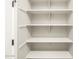 A pantry with multiple shelves providing lots of storage at 17648 W Pierson St, Goodyear, AZ 85395