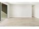 Neutral living space with patio doors at 17737 W Elm St, Goodyear, AZ 85395