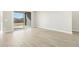 Living space with sliding glass door to the patio at 17737 W Elm St, Goodyear, AZ 85395