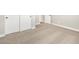Bedroom featuring neutral walls, carpet, and doors to other rooms in the house at 17749 W Elm St, Goodyear, AZ 85395