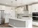 Modern kitchen with stainless steel appliances and a spacious island at 17749 W Elm St, Goodyear, AZ 85395