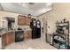 Kitchen boasts wood cabinets, granite countertops, and a full suite of appliances at 1828 W Curry Dr, Chandler, AZ 85224