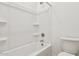 Clean bathroom features a shower-tub combo and a toilet at 47267 W Mellen Ln, Maricopa, AZ 85139