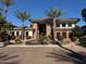 Community building with fountain and palm trees at 6900 E Princess Dr # 1219, Phoenix, AZ 85054