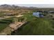 Aerial view of a golf course community with mountain views at 8567 E Overlook Dr, Scottsdale, AZ 85255