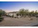 House exterior with paver driveway and desert landscaping at 8567 E Overlook Dr, Scottsdale, AZ 85255