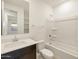 Clean bathroom featuring a shower-tub combo and modern vanity at 9120 N 174Th Ln, Waddell, AZ 85355