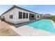 Sparkling pool and patio area with outdoor living space perfect for entertaining and relaxing at 11899 N Spearfish St, Surprise, AZ 85388