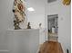 Upstairs hallway with wood floors and access to bedrooms at 12438 N Saguaro Blvd # 126, Fountain Hills, AZ 85268