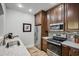 Well-equipped kitchen featuring stainless steel appliances and ample cabinetry at 12438 N Saguaro Blvd # 126, Fountain Hills, AZ 85268