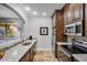 Modern kitchen with stainless steel appliances and granite countertops at 12438 N Saguaro Blvd # 126, Fountain Hills, AZ 85268