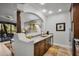 Open kitchen with granite countertops and a breakfast bar at 12438 N Saguaro Blvd # 126, Fountain Hills, AZ 85268