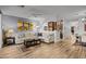 Open concept living room showcasing a comfortable sectional sofa and kitchen at 12438 N Saguaro Blvd # 126, Fountain Hills, AZ 85268