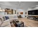 Bright and airy living area with hardwood floors and open kitchen view at 12438 N Saguaro Blvd # 126, Fountain Hills, AZ 85268