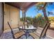 Covered patio features a bistro table and chairs at 12438 N Saguaro Blvd # 126, Fountain Hills, AZ 85268