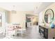 Bright dining area with table and chairs, view to kitchen at 14837 N 25Th Dr # 6, Phoenix, AZ 85023