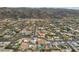 Aerial view of a house with a pool and desert landscape at 1750 E Euclid Ave, Phoenix, AZ 85042
