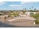 Single-story home with a large yard and driveway at 1750 E Euclid Ave, Phoenix, AZ 85042