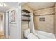Clean bathroom with shower/tub combo and floating shelves at 1750 E Euclid Ave, Phoenix, AZ 85042