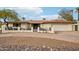 Front view of the house with a nice, clean driveway at 1750 E Euclid Ave, Phoenix, AZ 85042