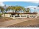 House with a landscaped yard and driveway at 1750 E Euclid Ave, Phoenix, AZ 85042