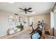 Bright home office featuring a Peloton exercise bike at 1750 E Euclid Ave, Phoenix, AZ 85042