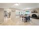 Modern kitchen with island and dining area at 1750 E Euclid Ave, Phoenix, AZ 85042