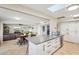 Eat-in kitchen with island and view into the living area at 1750 E Euclid Ave, Phoenix, AZ 85042