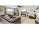 Spacious living room with comfortable seating and large TV at 1750 E Euclid Ave, Phoenix, AZ 85042