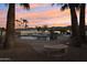 Inviting pool area with patio furniture and mountain views at 1750 E Euclid Ave, Phoenix, AZ 85042