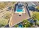 A high-angle view capturing a refreshing pool and shaded patio area, perfect for outdoor relaxation at 4510 N Pierce Ct, Buckeye, AZ 85396