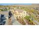 Stunning two-story home featuring beautiful landscaping, a spacious driveway, and elegant architectural details at 4510 N Pierce Ct, Buckeye, AZ 85396