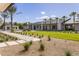 Expansive backyard showcasing lush lawn, large pool, modern home exterior, and desert landscaping at 6215 N Casa Blanca Dr, Paradise Valley, AZ 85253