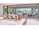 Stylish dining area with mountain views and seamless access to the outdoor space and kitchen at 6215 N Casa Blanca Dr, Paradise Valley, AZ 85253