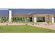 A well-manicured front yard with a modern home featuring large windows at 6215 N Casa Blanca Dr, Paradise Valley, AZ 85253
