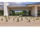 Contemporary home showcasing modern architecture, large windows, and desert landscaping at 6215 N Casa Blanca Dr, Paradise Valley, AZ 85253