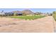 A well-manicured front lawn on a modern home with a mountain in the background at 6215 N Casa Blanca Dr, Paradise Valley, AZ 85253