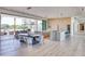 Open-concept kitchen featuring a large island, modern appliances, and an adjacent dining area at 6215 N Casa Blanca Dr, Paradise Valley, AZ 85253