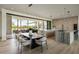 Open kitchen and dining area offer ample space and natural light with seamless access to outdoor living at 6215 N Casa Blanca Dr, Paradise Valley, AZ 85253